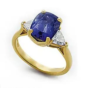 Lyric-ring-with-tanzanite-and-diamonds-in-yellow-gold_300x300 Lyric ring with Tanzanite cushion and diamond trilliants in 18k yellow gold